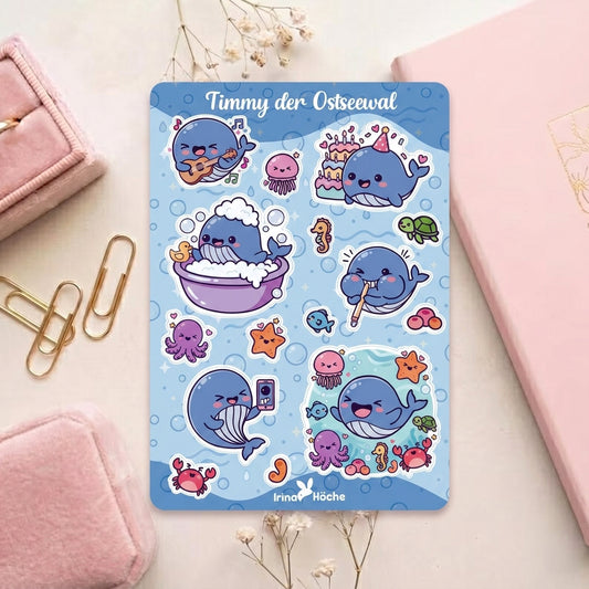 Kawaii Stickerbogen Timmy der Ostseewal mit über 15 Motiven auf hellblauem Hintergrund, Wal beim Gitarre spielen Baden Feiern und Selfie machen, glänzend laminiertes Vinyl 10×15 cm